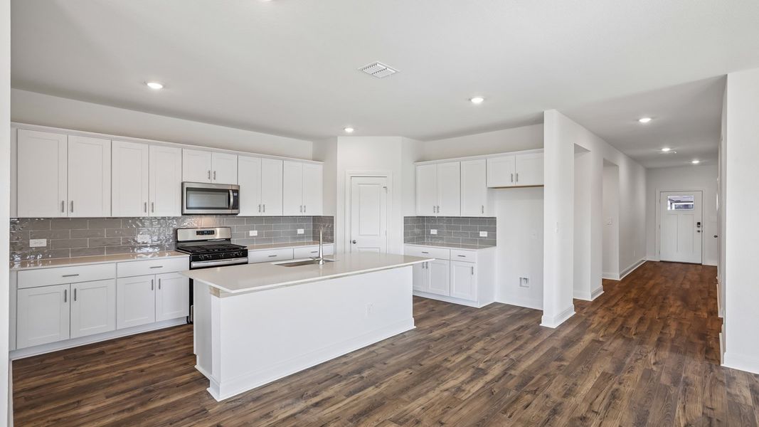 Furnished interior view inside a new home in Railhead, Cedar Creek (Image 3).
