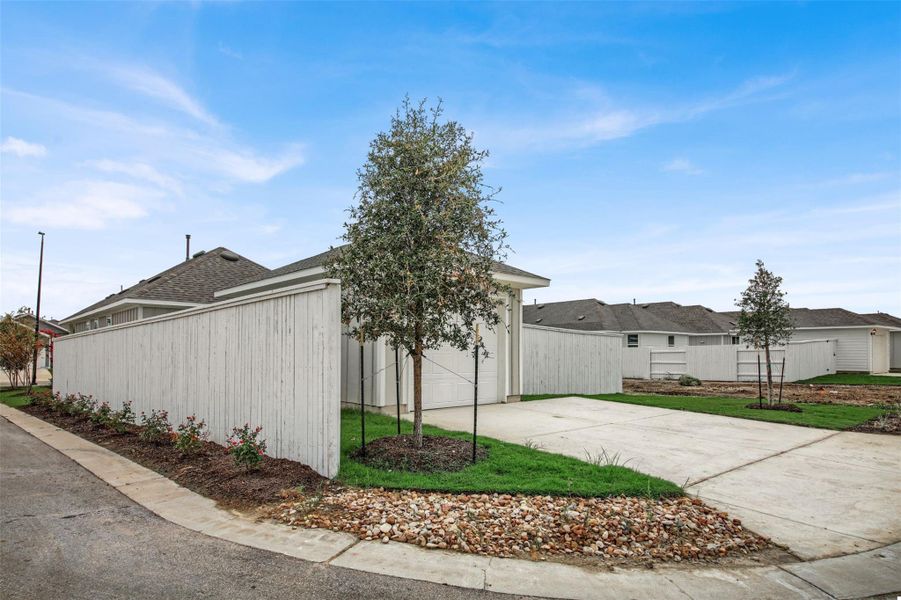 View of property exterior featuring driveway