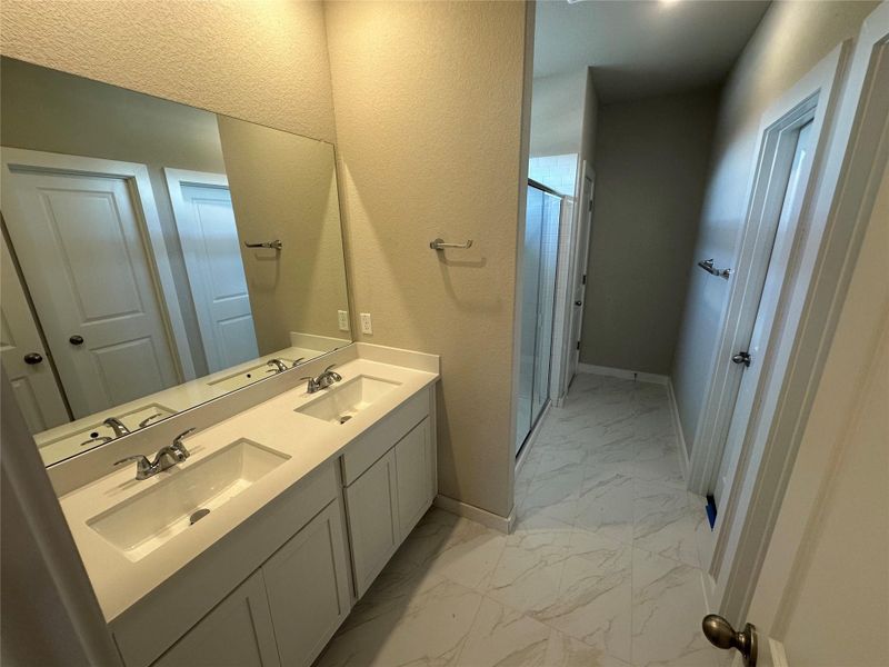 Primary Bath with dual vanities & walk-in shower