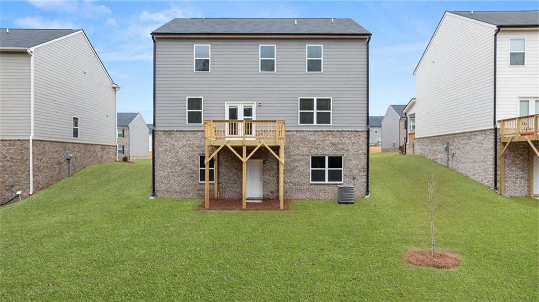 Exterior details and patio area of a home in The Reserve at Calcutta, Stockbridge (Image 3).