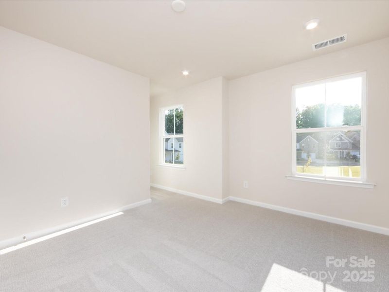Bedroom 3 with large walk-in closet.