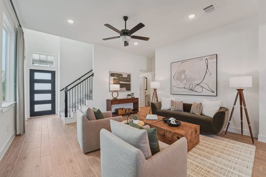 Representative furnished interior of a home built from the Versailles by Chesmar Homes in Bridgeland Chateau, Cypress (Image 3).