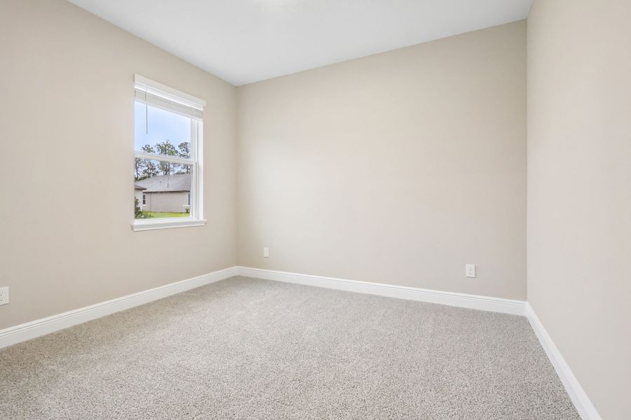 Spacious, unfurnished interior of a new home in Legends Preserve - Signature Series, Daytona Beach (Image 18).