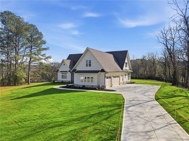 Front exterior of a new home in , Canton, GA, highlighting curb appeal (Image 30).