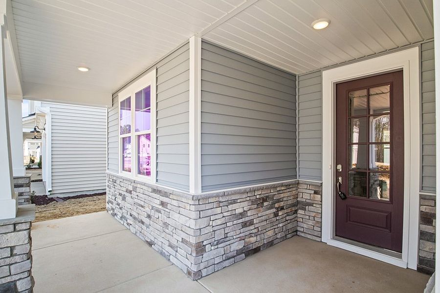 Representative exterior details of a home built from the The Whitley by RobuckHomes in Windwater, Hampstead (Image 42).