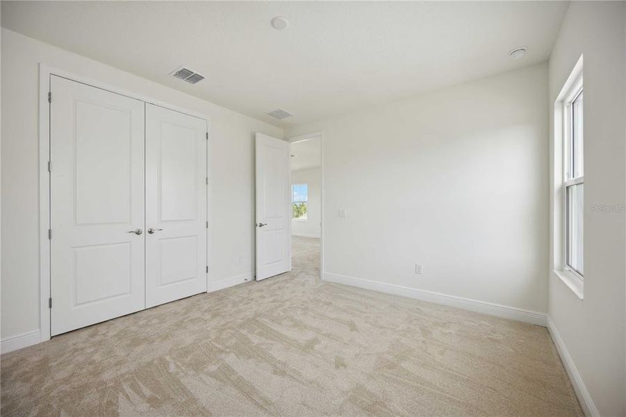Spacious, unfurnished interior of a new home in Bungalow Walk at Lakewood Ranch, Lakewood Ranch (Image 24).