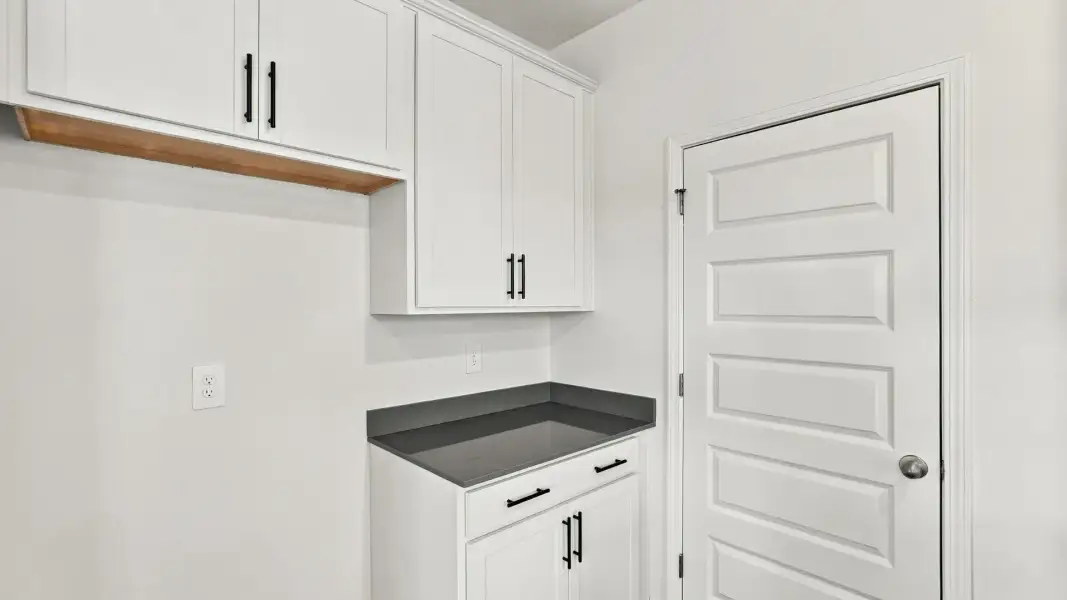 Furnished interior view inside a new home in The Lakes at North Glynn, Brunswick (Image 8).
