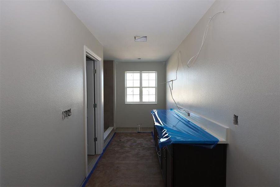 In-progress construction of a new home in Eden at Crossprairie, St. Cloud, FL (Image 9).