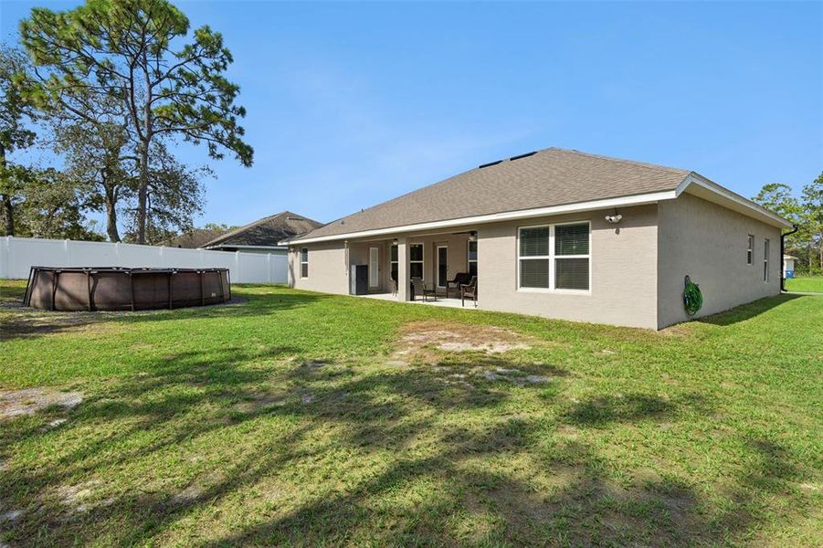 Exterior details and patio area of a home in Royal Highlands, Weeki Wachee (Image 22).