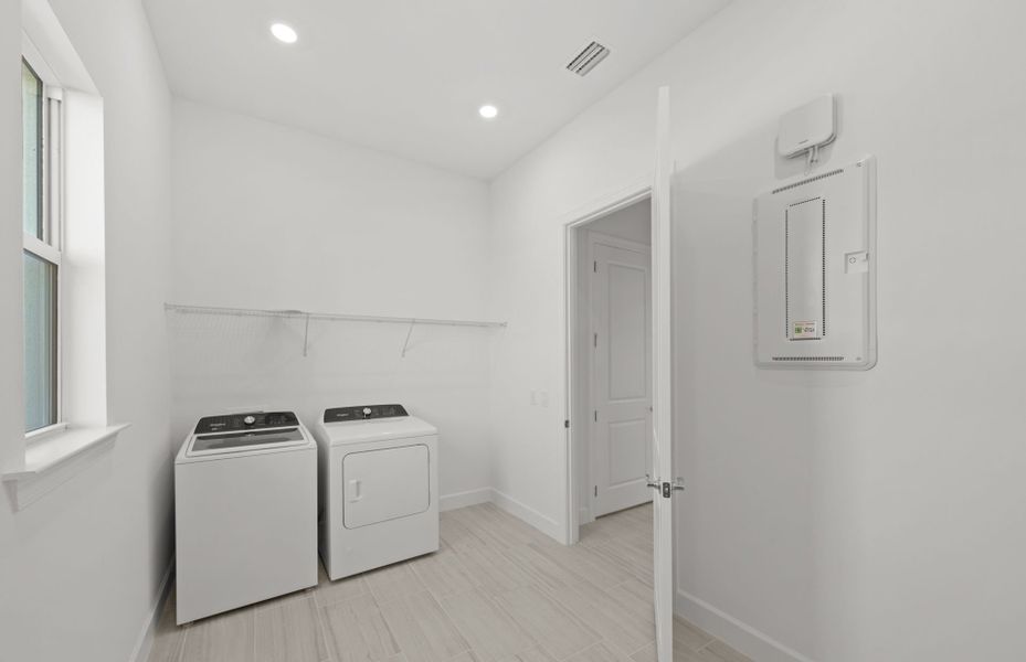 Furnished interior view inside a new home in TerraWalk at Babcock Ranch, Alva (Image 6).
