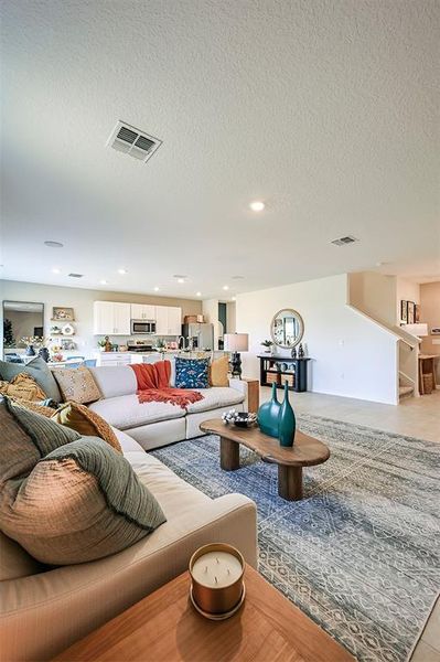 Furnished interior view inside a new home in Waterstone, Groveland (Image 12). Furnished interior view inside a new home in Waterstone, Groveland (Image 12).