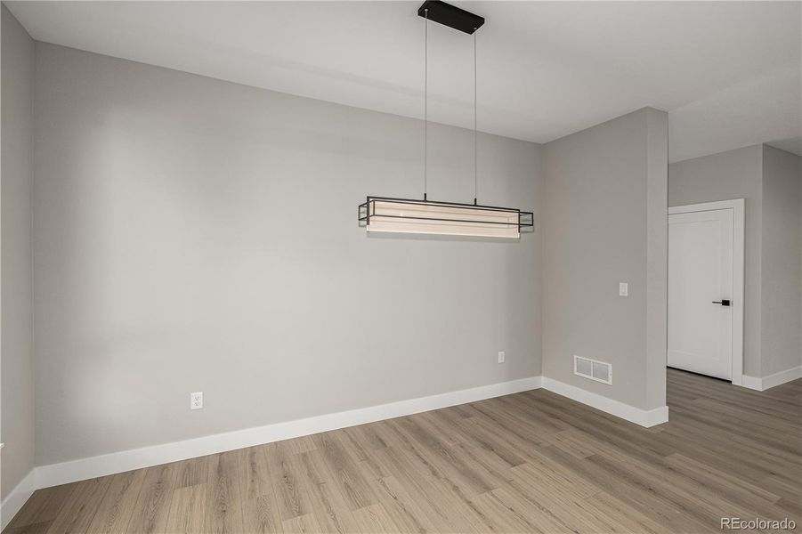 Spacious, unfurnished interior of a new home in West Grange, Longmont (Image 38).