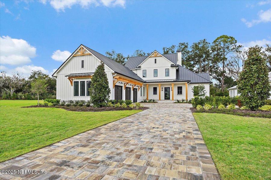 Front exterior of a new home in , Ponte Vedra, FL, highlighting curb appeal (Image 28).