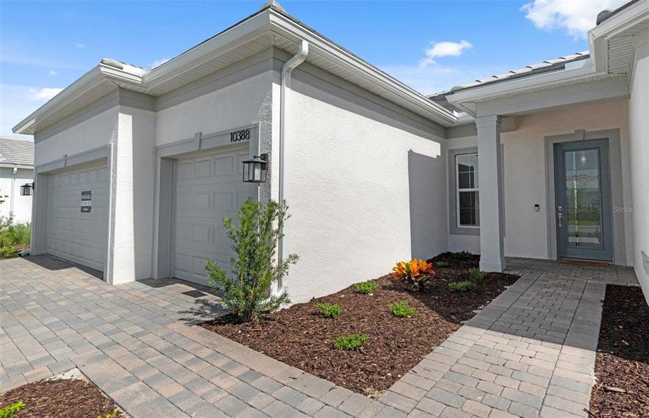 Exterior details and patio area of a home in BeachWalk by Manasota Key, Englewood (Image 3). Exterior details and patio area of a home in BeachWalk by Manasota Key, Englewood (Image 3).