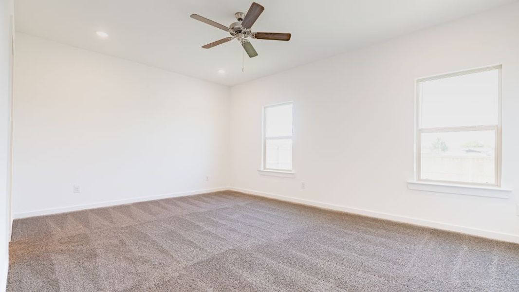 Representative unfurnished interior of a home built from the The Kendall by D.R. Horton in Overlook West, Wolfforth (Image 10).