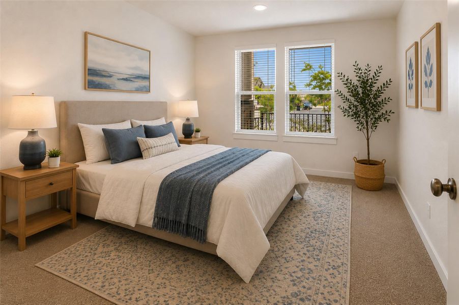 Natural light floods this inviting guest bedroom, offering a serene retreat with a calming aesthetic. Virtually Staged