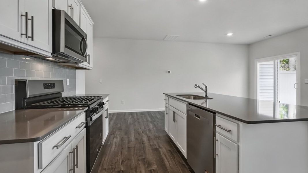 Furnished interior view inside a new home in Chapel Townes, Raleigh (Image 11). Furnished interior view inside a new home in Chapel Townes, Raleigh (Image 11).