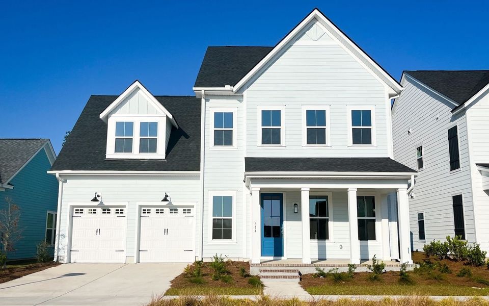 Front exterior of a new home in Nexton, Summerville, SC, highlighting curb appeal (Image 20).