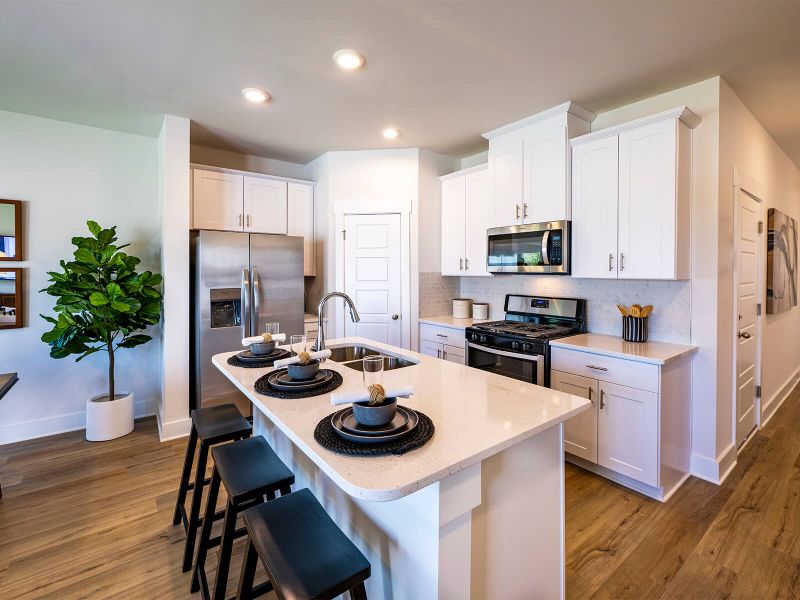 Prep dinner in the kitchen for guests. Photography from City Station Townes. Prep dinner in the kitchen for guests. Photography from City Station Townes.