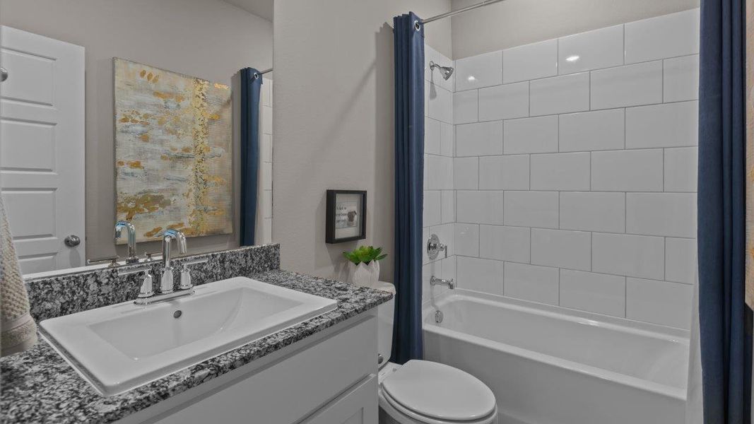 Representative furnished interior of a home built from the Portales by D.R. Horton in Heritage Parks, Abilene (Image 16).