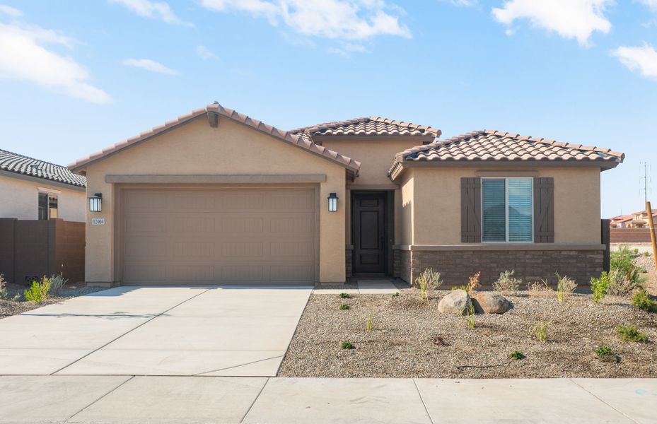 Front exterior of a new home in Alamar, Avondale, AZ, highlighting curb appeal (Image 18). Front exterior of a new home in Alamar, Avondale, AZ, highlighting curb appeal (Image 18).