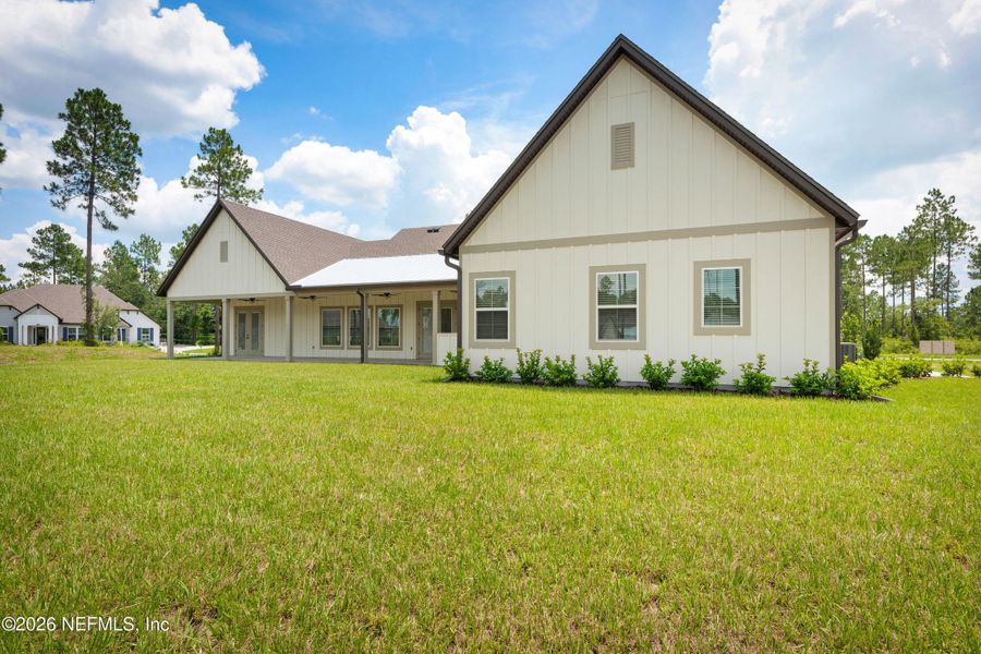 Front exterior of a new home in , Hilliard, FL, highlighting curb appeal (Image 21).