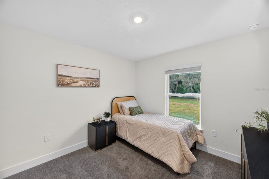 Furnished interior view inside a new home in Hill Country Estates, Dade City (Image 29).