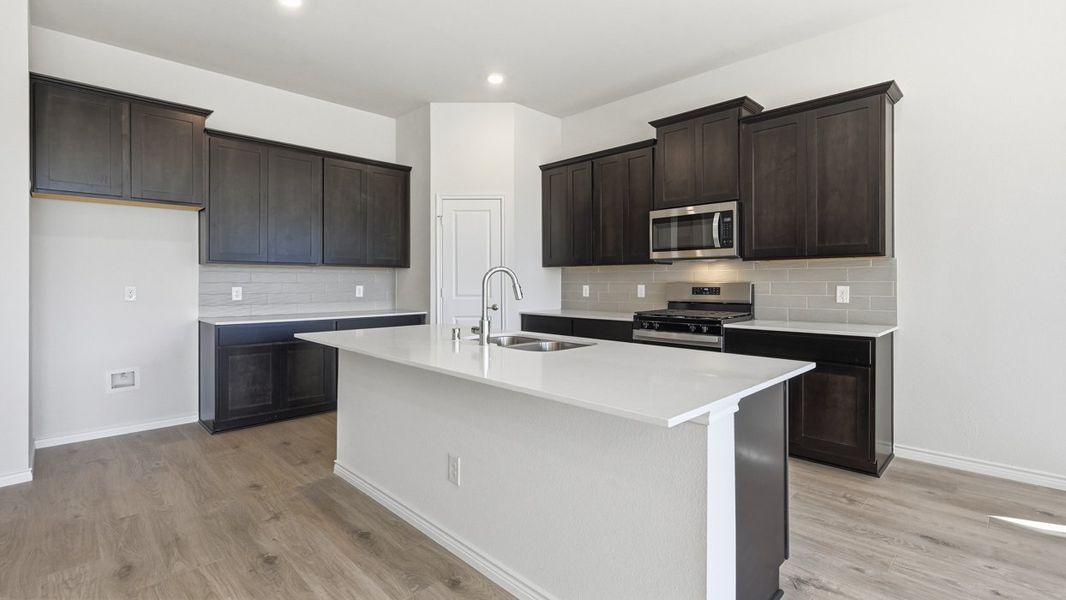 Furnished interior view inside a new home in The Woods at Lindsey Place, Anna (Image 3).