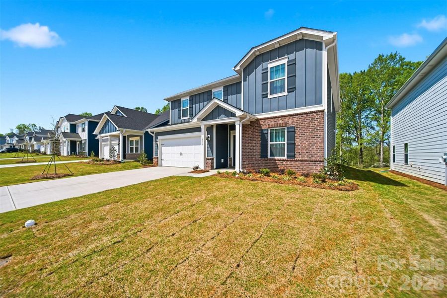 Front exterior of a new home in Buffalo Ridge, Newton, NC, highlighting curb appeal (Image 27).