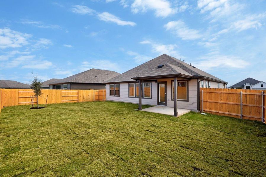 Exterior details and patio area of a home in Prairie Winds, Hutto (Image 19).