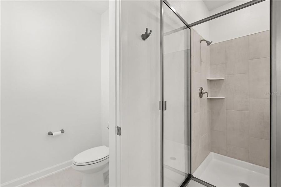 Furnished interior view inside a new home in Dora Parc, Mount Dora (Image 45).