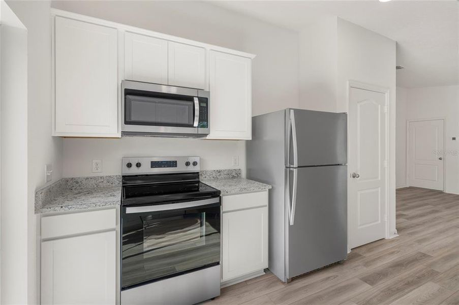 Furnished interior view inside a new home in Poinciana, Poinciana (Image 5).