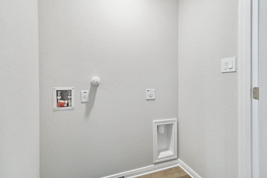 Representative furnished interior of a home built from the Duplex 5736 by TwoTen Communities in Emma Park, Buda (Image 8). Representative furnished interior of a home built from the Duplex 5736 by TwoTen Communities in Emma Park, Buda (Image 8).