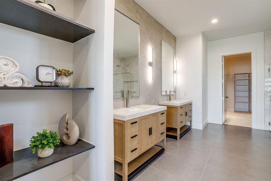 Full bathroom with two vanities, light tile patterned flooring, recessed lighting, and a shower Full bathroom with two vanities, light tile patterned flooring, recessed lighting, and a shower