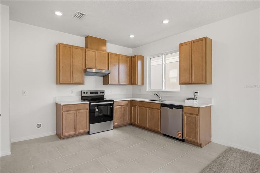 Furnished interior view inside a new home in Hickory Ranch, Auburndale (Image 8).