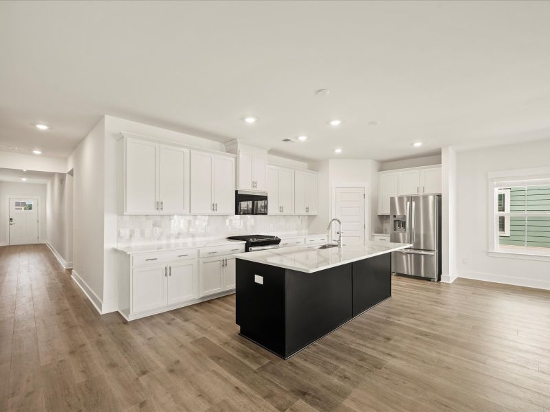 Furnished interior view inside a new home in The Coves at Lakes of Cane Bay, Summerville (Image 7).