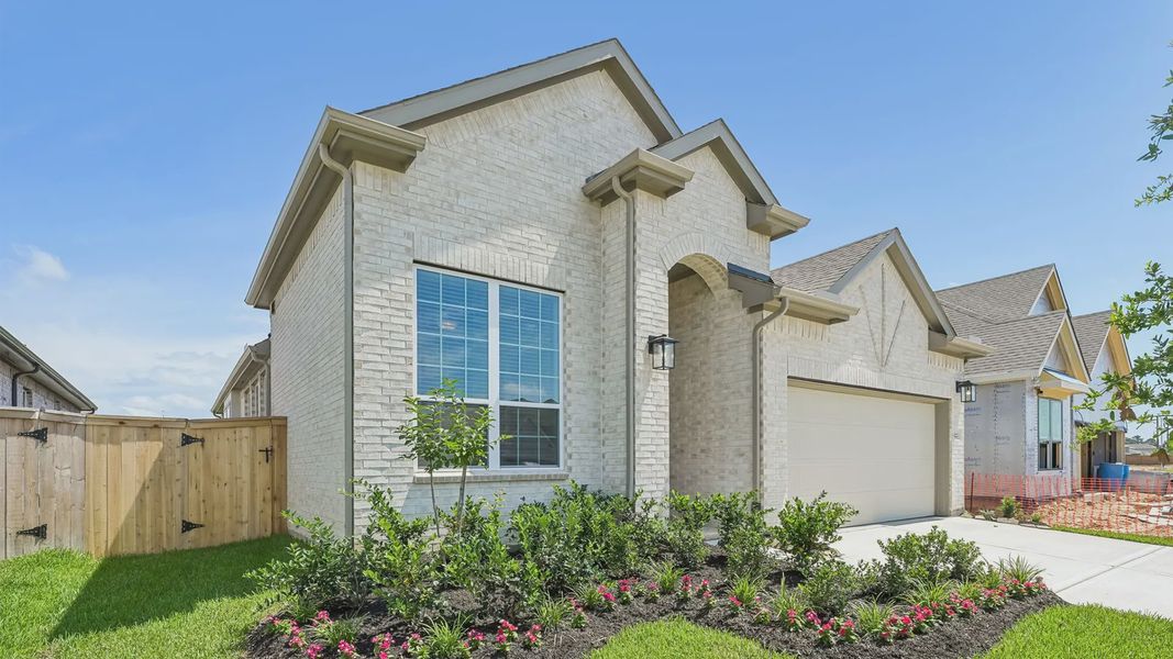 Representative exterior photo of a completed home built from the Rowan by Chesmar Homes in Briarwood, Elgin, TX (Image 20). Representative exterior photo of a completed home built from the Rowan by Chesmar Homes in Briarwood, Elgin, TX (Image 20).