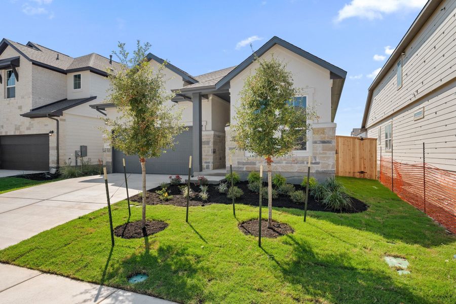 Front exterior of a new home in Park Central, Georgetown, TX, highlighting curb appeal (Image 22).