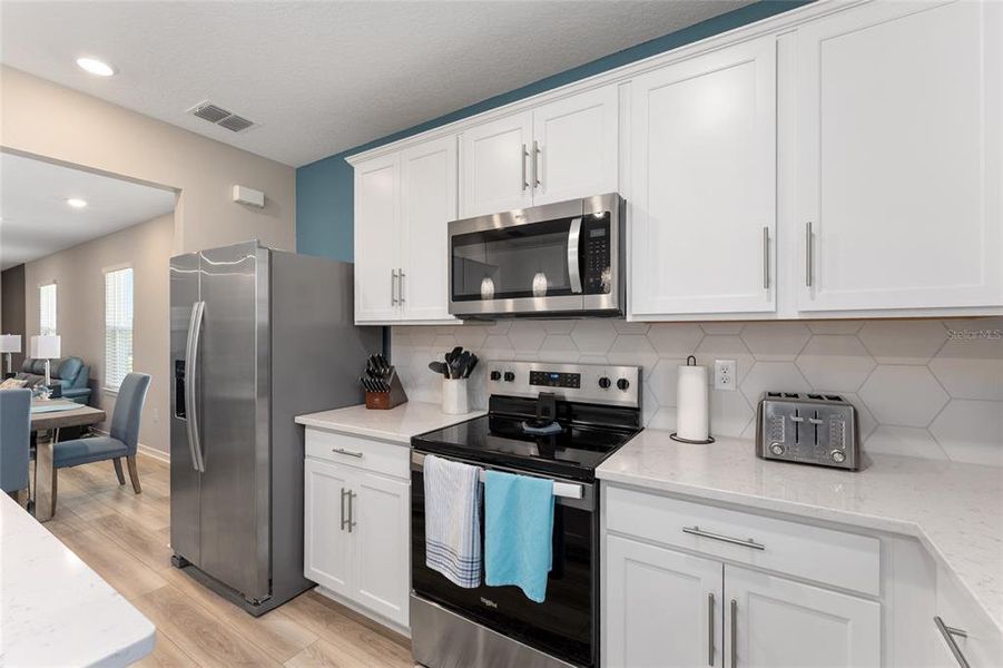 Furnished interior view inside a new home in Del Webb Stone Creek, Ocala (Image 32).