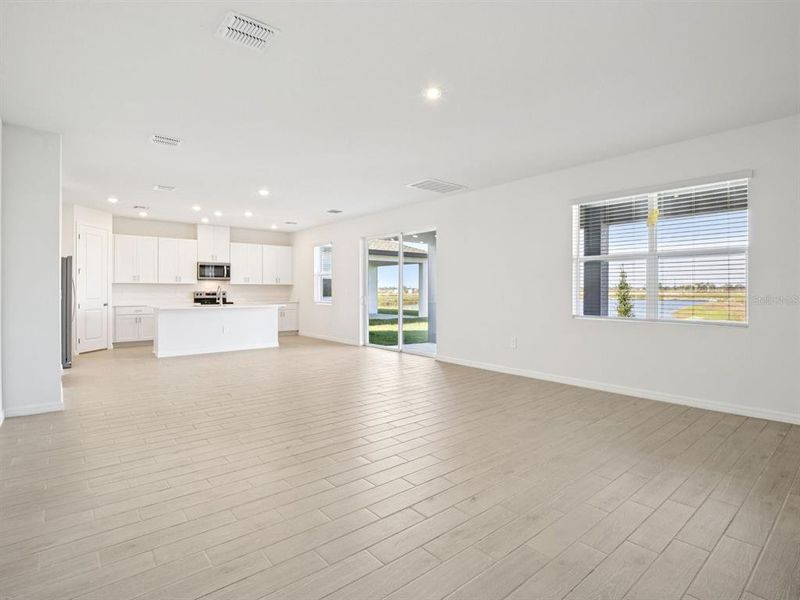Spacious, unfurnished interior of a new home in Coasterra - Reserve Series, Palmetto (Image 19).