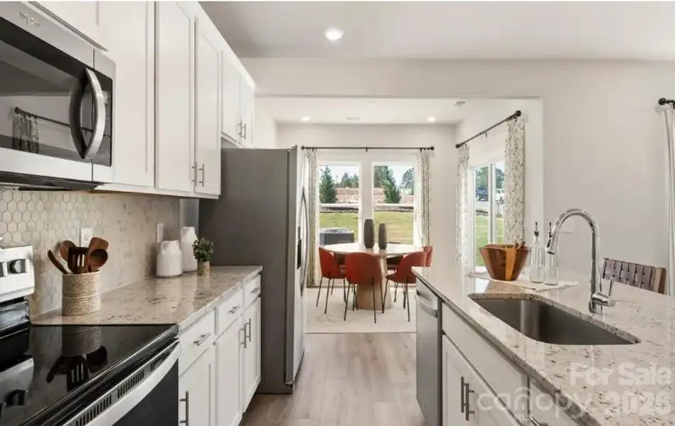 Photo is not of the actual home, but is an inspirational photo of builder’s model home and may depict options, furnishings, and/or decorator features that are not included