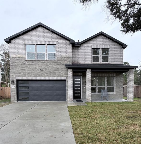 Front exterior of a new home in , Houston, TX, highlighting curb appeal (Image 24).
