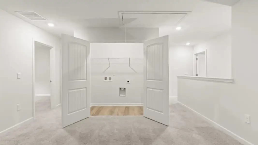 Spacious, unfurnished interior of a new home in Waypoint, Flowery Branch (Image 23).