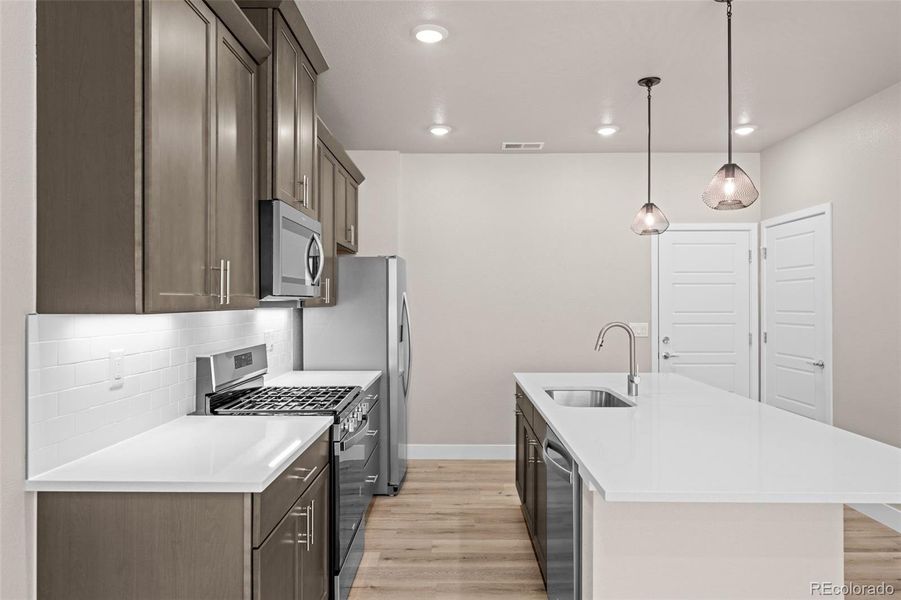 Furnished interior view inside a new home in Ralston Creek, Arvada (Image 4).