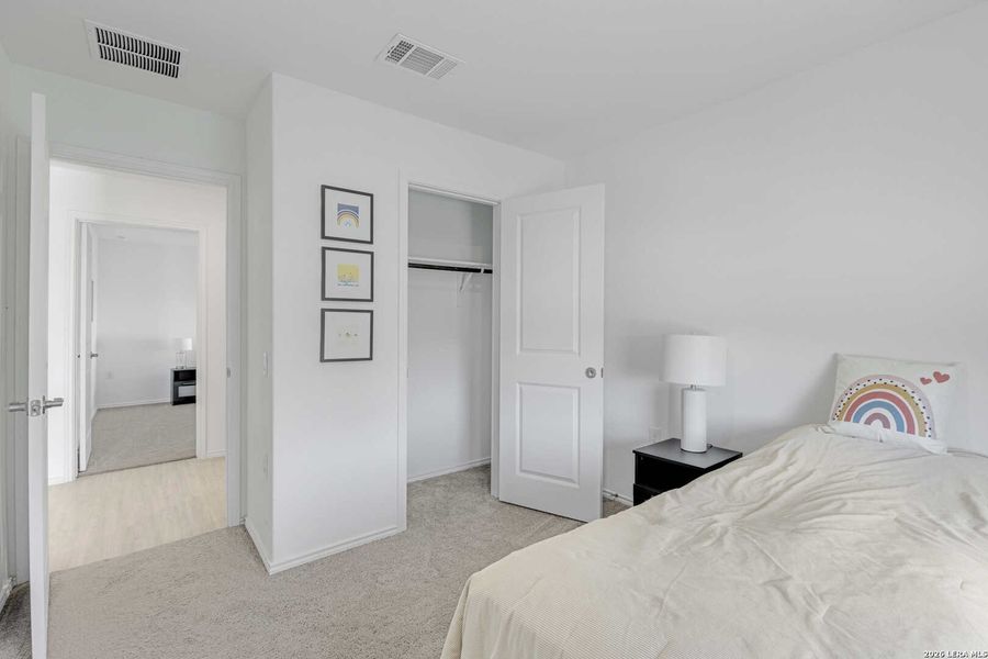 Furnished interior view inside a new home in Mission del Lago, San Antonio (Image 13).