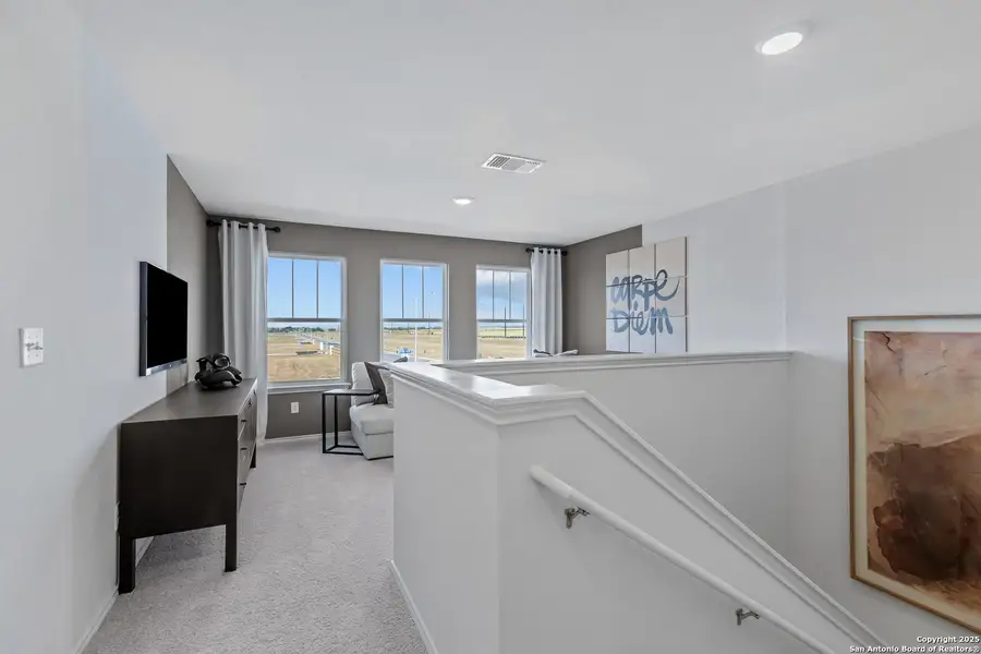 Furnished interior view inside a new home in Dove Song, San Antonio (Image 4).