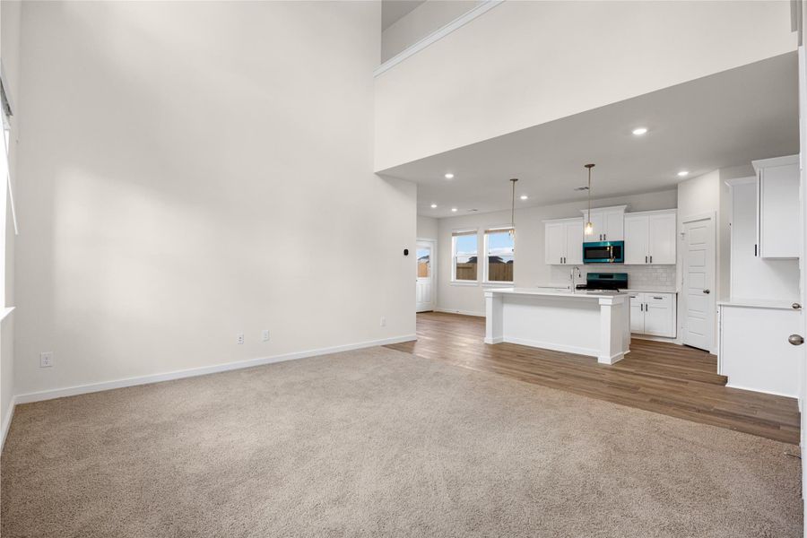 Spacious, unfurnished interior of a new home in Creekhaven, Iowa Colony (Image 15).