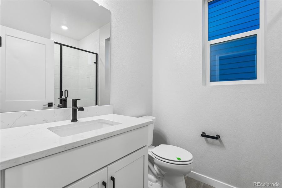 Furnished interior view inside a new home in Tribute at Lyric, Lone Tree (Image 16).