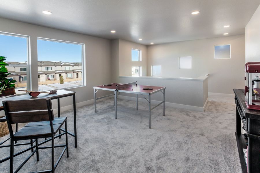 Representative furnished interior of a home built from the Tesla by Hartford Homes in Trailside, Timnath (Image 15).