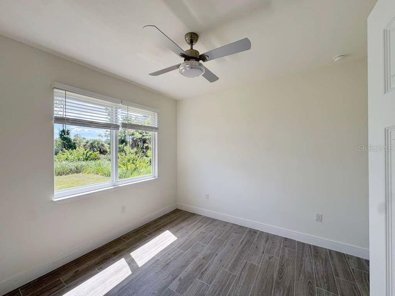 Spacious, unfurnished interior of a new home in , Port Charlotte (Image 14).